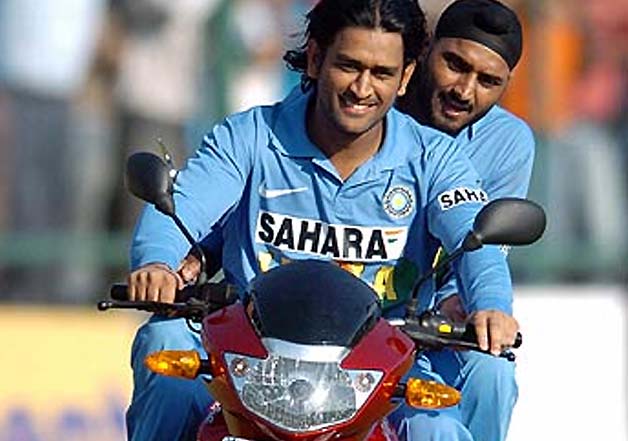 dhoni driving bike on field