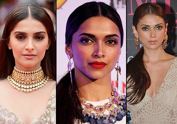 middle parted sleek hairstyles bollywood 