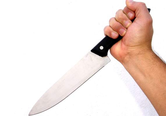 Man stabs wife and three relatives, one dead