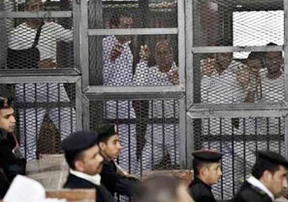 View journalists put inside cage during trial in Egypt