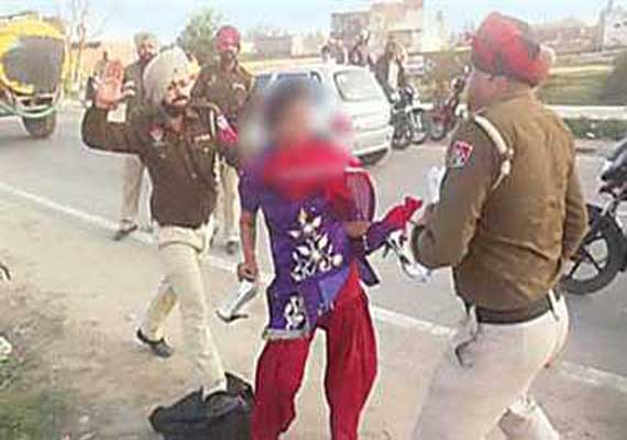 Woman thrashing: Two policemen arrested