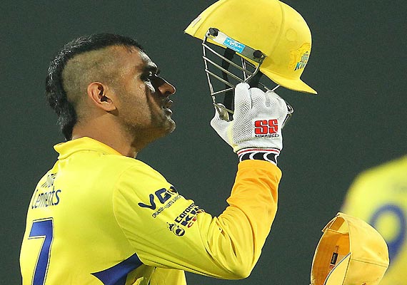 M S Dhoni sports new hairstyle at Champions League match